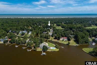 Incredible opportunity to own a canalfront home with beautiful on Duck Woods Country Club in North Carolina - for sale on GolfHomes.com, golf home, golf lot