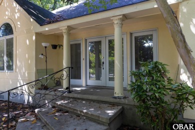 Incredible opportunity to own a canalfront home with beautiful on Duck Woods Country Club in North Carolina - for sale on GolfHomes.com, golf home, golf lot