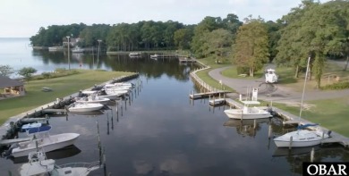 Incredible opportunity to own a canalfront home with beautiful on Duck Woods Country Club in North Carolina - for sale on GolfHomes.com, golf home, golf lot