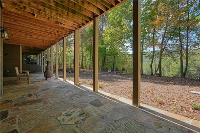 Welcome to the timeless rustic elegance of 490 Wedgewood Drive on Big Canoe Golf Club - Cherokee in Georgia - for sale on GolfHomes.com, golf home, golf lot