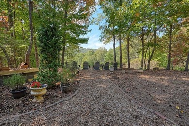 Welcome to the timeless rustic elegance of 490 Wedgewood Drive on Big Canoe Golf Club - Cherokee in Georgia - for sale on GolfHomes.com, golf home, golf lot