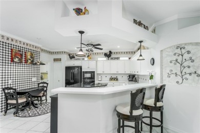 Under contract-accepting backup offers. Newly adjusted price for on The Groves Golf and Country Club in Florida - for sale on GolfHomes.com, golf home, golf lot