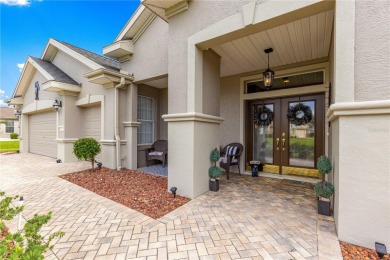 Welcome to this exquisite Home in Guard Gated Del Webb Spruce on Eagle Ridge At Spruce Creek Country Club in Florida - for sale on GolfHomes.com, golf home, golf lot