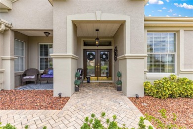 Welcome to this exquisite Home in Guard Gated Del Webb Spruce on Eagle Ridge At Spruce Creek Country Club in Florida - for sale on GolfHomes.com, golf home, golf lot