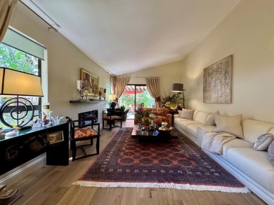 Located on a scenic cul-de-sac, this beautifully renovated home on Villages Golf and Country Club in California - for sale on GolfHomes.com, golf home, golf lot