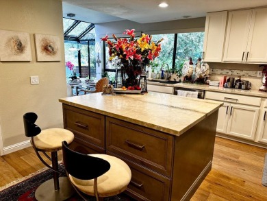 Located on a scenic cul-de-sac, this beautifully renovated home on Villages Golf and Country Club in California - for sale on GolfHomes.com, golf home, golf lot
