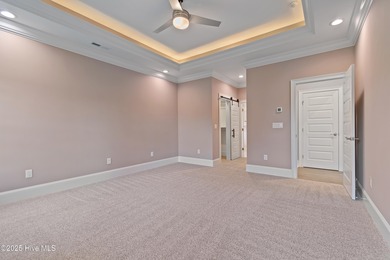 This brand new Riptide home with stunning setting and finishes on Sea Trail Golf Resort in North Carolina - for sale on GolfHomes.com, golf home, golf lot