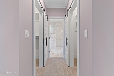 This brand new Riptide home with stunning setting and finishes on Sea Trail Golf Resort in North Carolina - for sale on GolfHomes.com, golf home, golf lot