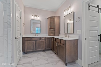 This brand new Riptide home with stunning setting and finishes on Sea Trail Golf Resort in North Carolina - for sale on GolfHomes.com, golf home, golf lot