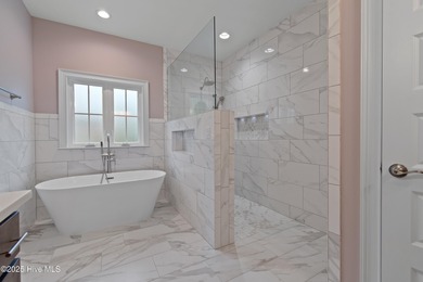 This brand new Riptide home with stunning setting and finishes on Sea Trail Golf Resort in North Carolina - for sale on GolfHomes.com, golf home, golf lot