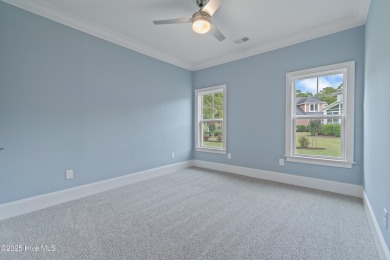 This brand new Riptide home with stunning setting and finishes on Sea Trail Golf Resort in North Carolina - for sale on GolfHomes.com, golf home, golf lot