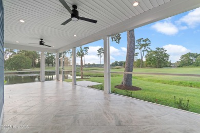 This brand new Riptide home with stunning setting and finishes on Sea Trail Golf Resort in North Carolina - for sale on GolfHomes.com, golf home, golf lot