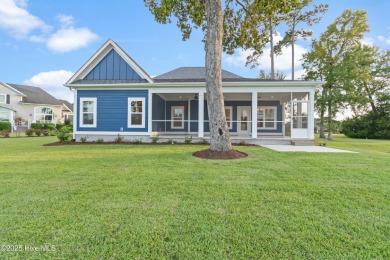 This brand new Riptide home with stunning setting and finishes on Sea Trail Golf Resort in North Carolina - for sale on GolfHomes.com, golf home, golf lot