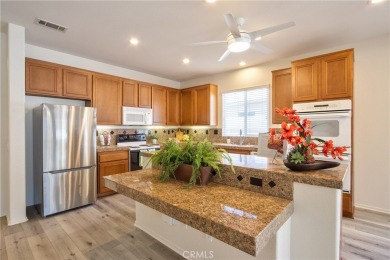 Welcome to this immaculate, single-story 2-bedroom, 2-bath + on Menifee Lakes Country Club - Lakes in California - for sale on GolfHomes.com, golf home, golf lot