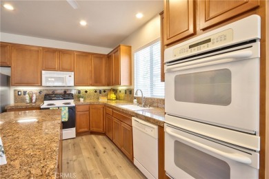 Welcome to this immaculate, single-story 2-bedroom, 2-bath + on Menifee Lakes Country Club - Lakes in California - for sale on GolfHomes.com, golf home, golf lot