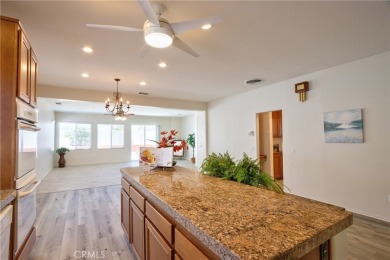 Welcome to this immaculate, single-story 2-bedroom, 2-bath + on Menifee Lakes Country Club - Lakes in California - for sale on GolfHomes.com, golf home, golf lot