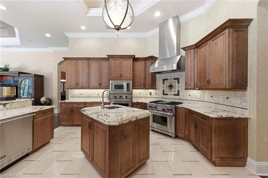 Discover refined living in this custom-built, two-story estate on Naples National Golf Club in Florida - for sale on GolfHomes.com, golf home, golf lot