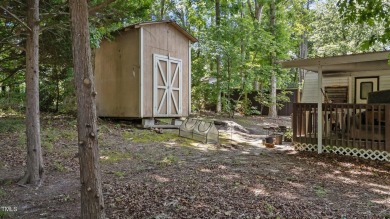 LOCATION!! LOCATION!! Lots of Potential for This Level Camp Lot on River Golf and County Club at Lake Royale in North Carolina - for sale on GolfHomes.com, golf home, golf lot