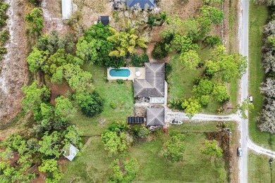 1+ ACRE | AG-2 | POOL HOME | NO HOA | FLOOD ZONE X. Set on on Herons Glen Golf and Country Club in Florida - for sale on GolfHomes.com, golf home, golf lot