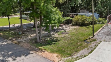 LOCATION!! LOCATION!! Lots of Potential for This Level Camp Lot on River Golf and County Club at Lake Royale in North Carolina - for sale on GolfHomes.com, golf home, golf lot