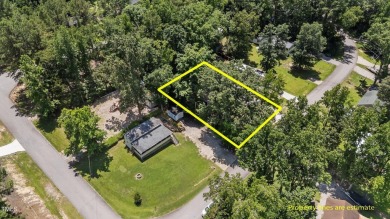 LOCATION!! LOCATION!! Lots of Potential for This Level Camp Lot on River Golf and County Club at Lake Royale in North Carolina - for sale on GolfHomes.com, golf home, golf lot