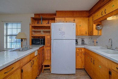 Coastal charm with Aransas Bay views in the heart of Rockport! on Rockport Country Club in Texas - for sale on GolfHomes.com, golf home, golf lot