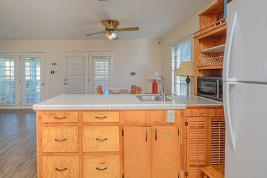 Coastal charm with Aransas Bay views in the heart of Rockport! on Rockport Country Club in Texas - for sale on GolfHomes.com, golf home, golf lot