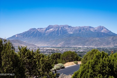 This exceptional lot sits on one of the premier streets in Red on Red Ledges Golf Club in Utah - for sale on GolfHomes.com, golf home, golf lot