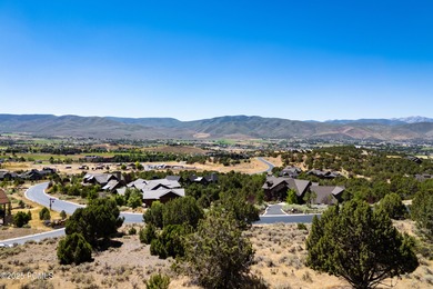 This exceptional lot sits on one of the premier streets in Red on Red Ledges Golf Club in Utah - for sale on GolfHomes.com, golf home, golf lot