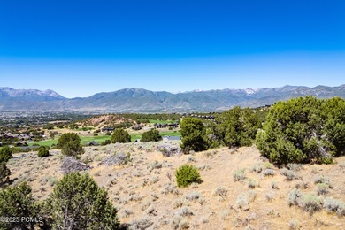 This exceptional lot sits on one of the premier streets in Red on Red Ledges Golf Club in Utah - for sale on GolfHomes.com, golf home, golf lot