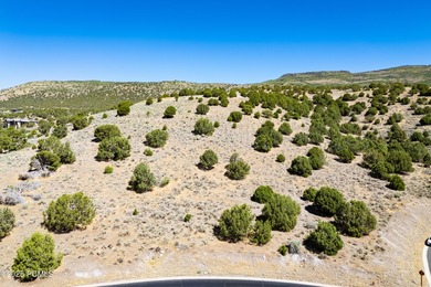 This exceptional lot sits on one of the premier streets in Red on Red Ledges Golf Club in Utah - for sale on GolfHomes.com, golf home, golf lot