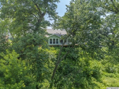STUNNING 4 BDRM 2.5 BATH HOME TASTEFULLY DECORATED WITH on Ridgestone Golf Club in Iowa - for sale on GolfHomes.com, golf home, golf lot