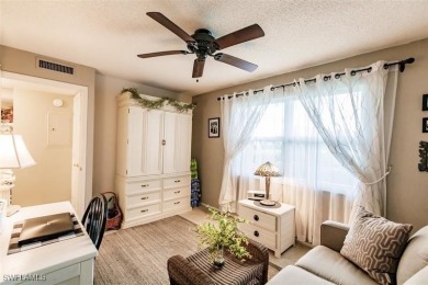Lovely, well-kept 1st floor unit. Sit in the enclosed lanai on Seven Lakes Golf and Tennis Community in Florida - for sale on GolfHomes.com, golf home, golf lot
