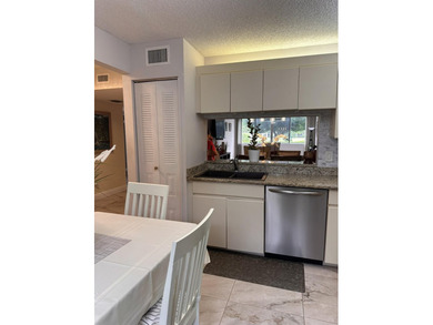 Great 1.444 sf unit on first floor 2/2 plus a bonus room that on Poinciana Golf Club in Florida - for sale on GolfHomes.com, golf home, golf lot