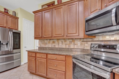 Popular, open floor plan in the PGA Village! with furniture on The Legacy Golf and Tennis Club in Florida - for sale on GolfHomes.com, golf home, golf lot