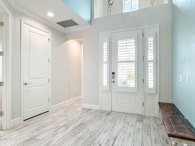 A Masterpiece of indoor-outdoor living in Latitude on LPGA International Golf Course in Florida - for sale on GolfHomes.com, golf home, golf lot