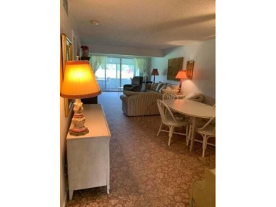 Large 2/2  corner unit  X-large screened in patio with beautiful on Hunters Run Golf and Country Club in Florida - for sale on GolfHomes.com, golf home, golf lot