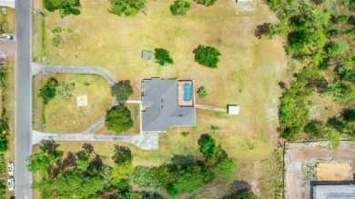 MUST SEE 4/2 POOL home sitting on 1.24 acres!  This well on Wedgefield Golf Club in Florida - for sale on GolfHomes.com, golf home, golf lot