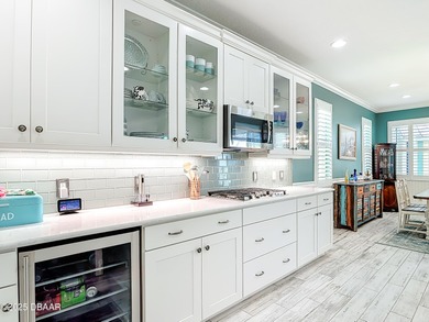 A Masterpiece of indoor-outdoor living in Latitude on LPGA International Golf Course in Florida - for sale on GolfHomes.com, golf home, golf lot