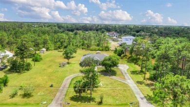 MUST SEE 4/2 POOL home sitting on 1.24 acres!  This well on Wedgefield Golf Club in Florida - for sale on GolfHomes.com, golf home, golf lot