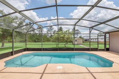 MUST SEE 4/2 POOL home sitting on 1.24 acres!  This well on Wedgefield Golf Club in Florida - for sale on GolfHomes.com, golf home, golf lot