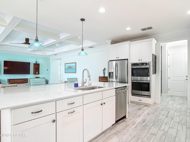 A Masterpiece of indoor-outdoor living in Latitude on LPGA International Golf Course in Florida - for sale on GolfHomes.com, golf home, golf lot