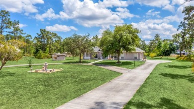 MUST SEE 4/2 POOL home sitting on 1.24 acres!  This well on Wedgefield Golf Club in Florida - for sale on GolfHomes.com, golf home, golf lot