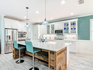 A Masterpiece of indoor-outdoor living in Latitude on LPGA International Golf Course in Florida - for sale on GolfHomes.com, golf home, golf lot