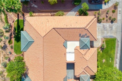 Stretching over the Arnold Palmer fairway, the city, and on The Oasis Golf Club in Nevada - for sale on GolfHomes.com, golf home, golf lot