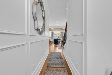 This contemporary home in Myrtle Beach offers clean design and on Cane Patch Driving Range in South Carolina - for sale on GolfHomes.com, golf home, golf lot