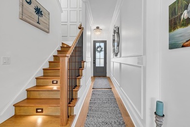 This contemporary home in Myrtle Beach offers clean design and on Cane Patch Driving Range in South Carolina - for sale on GolfHomes.com, golf home, golf lot