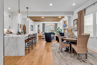 This contemporary home in Myrtle Beach offers clean design and on Cane Patch Driving Range in South Carolina - for sale on GolfHomes.com, golf home, golf lot