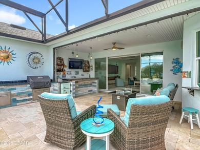 A Masterpiece of indoor-outdoor living in Latitude on LPGA International Golf Course in Florida - for sale on GolfHomes.com, golf home, golf lot