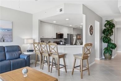 Fresh, light-filled and offered turnkey, this first-floor coach on The Rookery At Marco in Florida - for sale on GolfHomes.com, golf home, golf lot